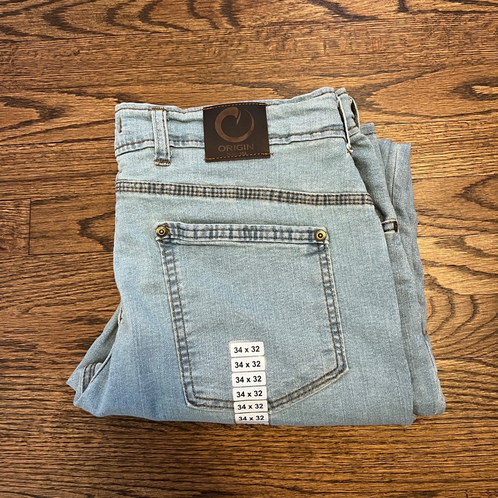 Origin Delta 68 light wash Tapered Fit (Fighters Fit) jeans.